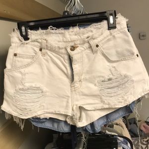 UO high waisted white jean shorts